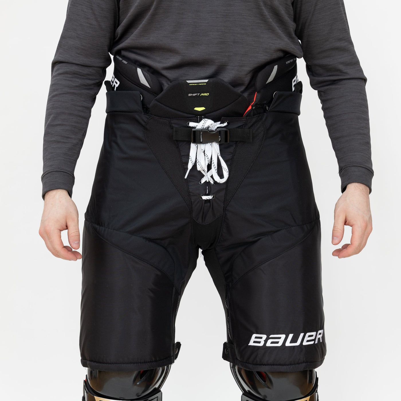 https://www.thehockeyshop.com/cdn/shop/products/bauer-hockey-pants-bauer-vapor-shift-pro-senior-hockey-pants-29084693856322_1400x.jpg?v=1681347968
